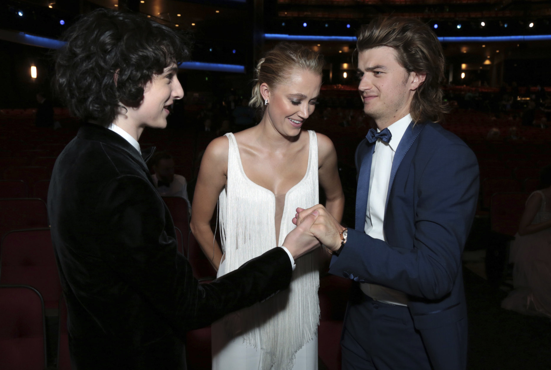 IMAGE DISTRIBUTED FOR THE TELEVISION ACADEMY - Finn Wolfhard, Maika Monroe and Joe Keery at the 70th Primetime Emmy Awards on Monday, Sept. 17, 2018, at the Microsoft Theater in Los Angeles. (Photo by Alex Berliner/Invision for the Television Academy/AP Images)