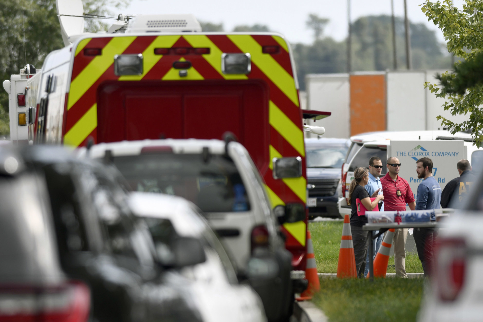 Law enforcement officials gather near the scene where a shooting took place in Aberdeen, Md., on Thursday, Sept. 20, 2018. (AP Photo/Steve Ruark)