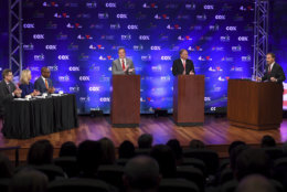 Republican Corey Stewart, at left podium, and Democratic U.S. Sen. Tim Kaine, at center podium, participate in a senatorial debate as moderator Chuck Todd stands at right, Wednesday, Sept. 26, 2018, at Capital One headquarters, in McLean, Va. (Katherine Frey/The Washington Post via AP, Pool)