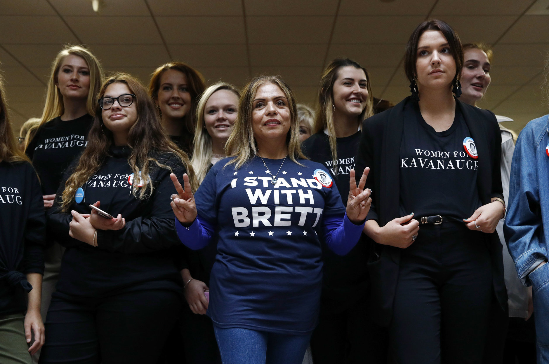 Supporters of Supreme Court nominee Brett Kavanaugh gather inside the Hart Senate Office Building on Capitol Hill in Washington, Thursday, Sept. 27, 2018. The Senate Judiciary Committee is hearing from Christine Blasey Ford, the woman who says Kavanaugh sexually assaulted her. (AP Photo/Patrick Semansky)