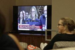 Students at the University of North Carolina School of Law in Chapel Hill, N.C. watch Christine Blasey Ford as she testifies before the Senate Judiciary Committee Thursday, Sept. 27, 2018. (AP Photo/Gerry Broome)
