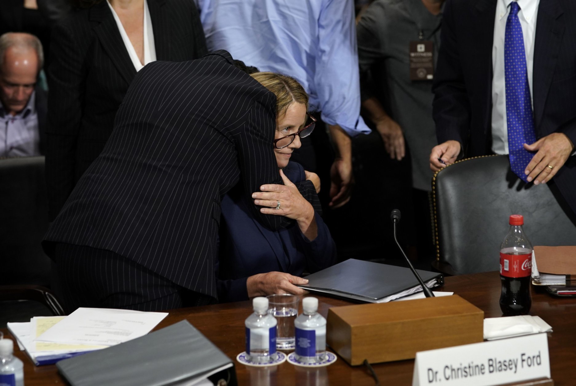 Christine Blasey Ford is hugged by her attorney Debra Katz after she finished testifying before the Senate Judiciary Committee on Capitol Hill in Washington, Thursday, Sept. 27, 2018. (AP Photo/Andrew Harnik, Pool)