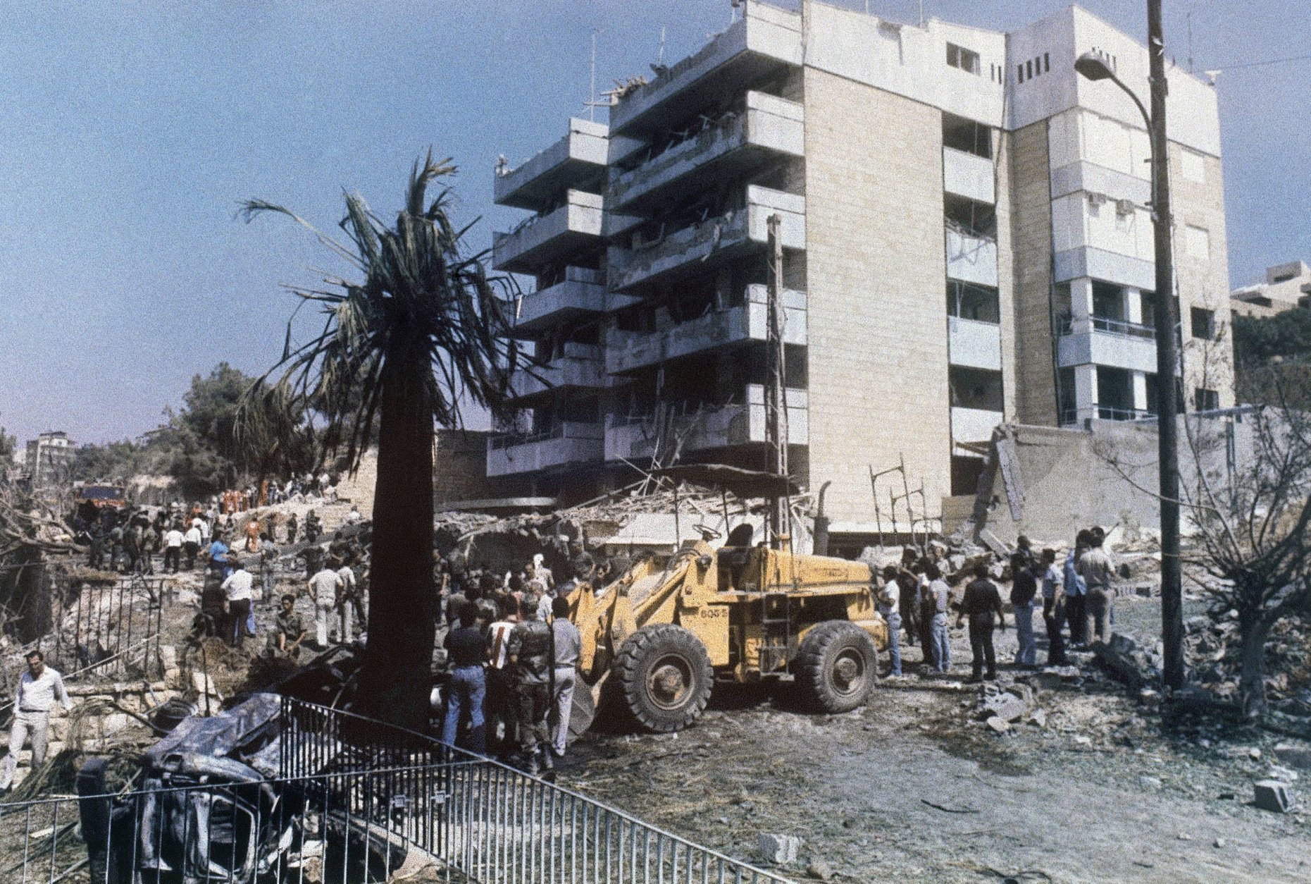 Scene looks toward the wreckage of the American Embassy annex, in Christian East Beirut, Lebanon, on Sept. 20, 1984 after a terrorist car bomb had been driven into the area and exploded, killing 23 persons and injuring more than 60 others. (AP Photo/Zouheir Saade)