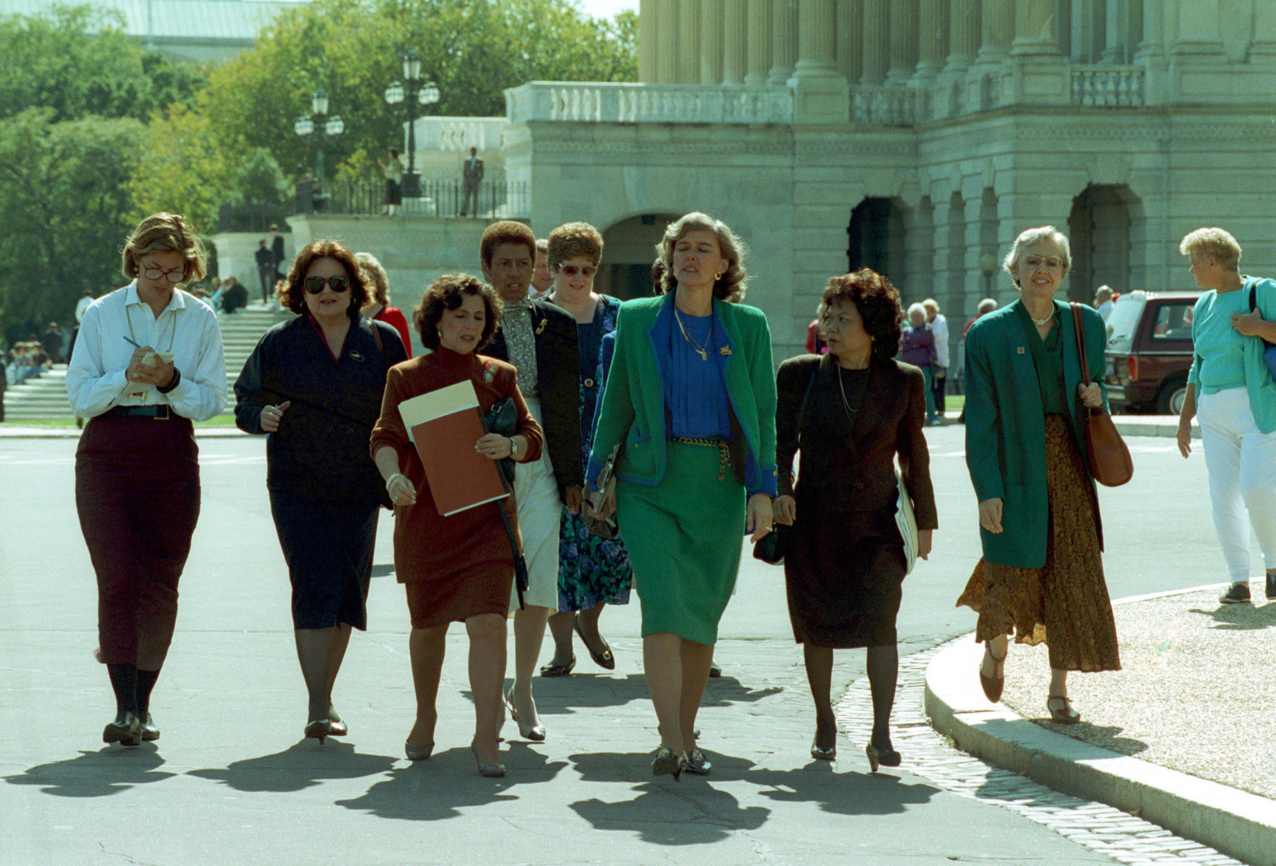 Rep. Patricia Schroeder, D-Colo., center, leads a delegation of congressswomen from the House to the Senate on Capitol Hill to voice their concerns on the nomination of Clarence Thomas to the Supreme Court in Washington D.C., Oct. 8, 1991.  Accompanying Schroeder, from left, are, Louise Slaughter, D-N.Y., Barbara Boxer, D-Calif., Eleanor Holmes-Norton, D-D.C., Nita Lowey, D-N.Y., Patsey Mink, D-Hi., and Jolene Unsoeld, D-Wash.  (AP Photo/Marcy Nighswander)