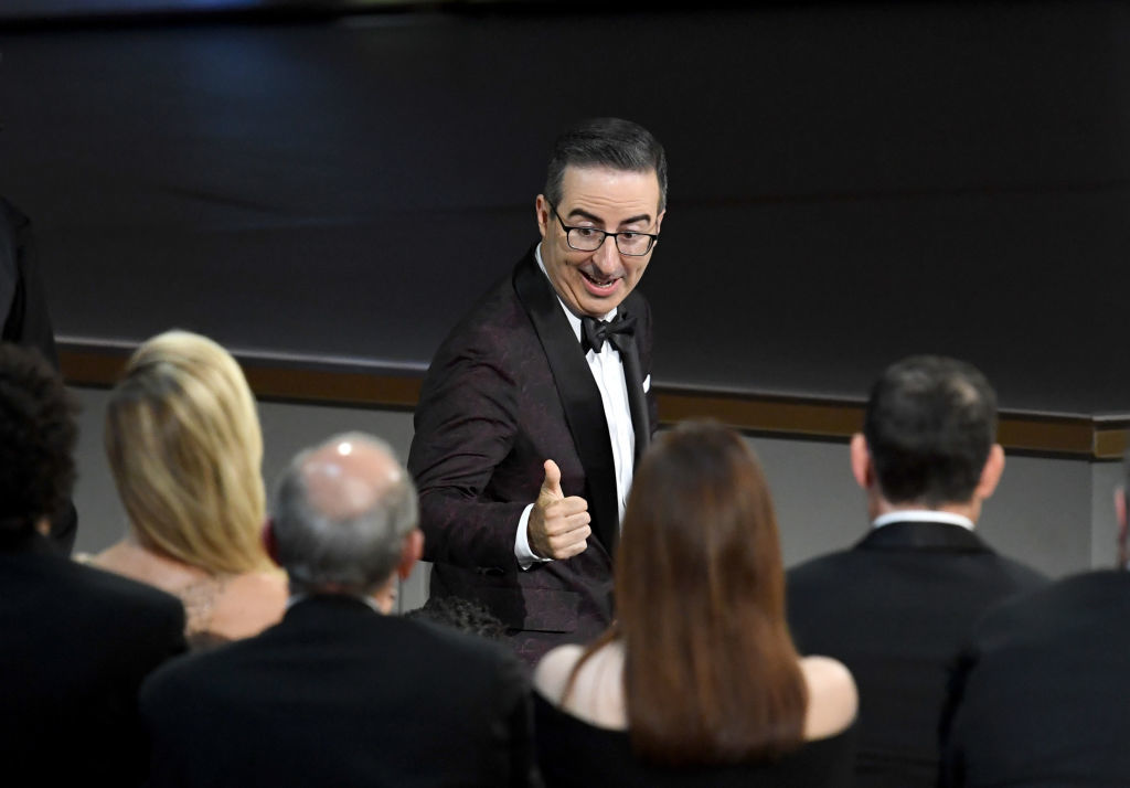 LOS ANGELES, CA - SEPTEMBER 17:  John Oliver reacts after being named winner of the Outstanding Variety Talk Series award for 'Last Week Tonight with John Oliver' during the 70th Emmy Awards at Microsoft Theater on September 17, 2018 in Los Angeles, California.  (Photo by Kevin Winter/Getty Images)