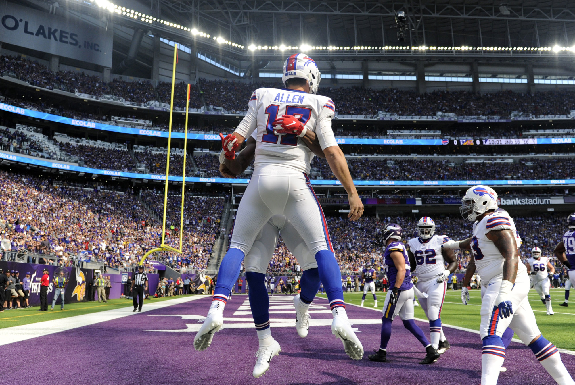 MINNEAPOLIS, MN - SEPTEMBER 23: Josh Allen #17 of the Buffalo Bills celebrates with teammates after scoring a touchdown in the first quarter of the game against the Minnesota Vikings at U.S. Bank Stadium on September 23, 2018 in Minneapolis, Minnesota. (Photo by Hannah Foslien/Getty Images)