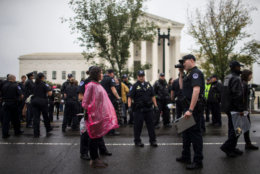 WASHINGTON, DC - SEPTEMBER 27: Police arrest protestors demonstrating against Supreme Court Nominee Brett Kavanaugh near the U.S. Supreme Court on September 27, 2018 in Washington, DC. On Thursday, Christine Blasey Ford, who has accused Kavanaugh of sexual assault, is testifying before the Senate Judiciary Committee.  (Photo by Zach Gibson/Getty Images)