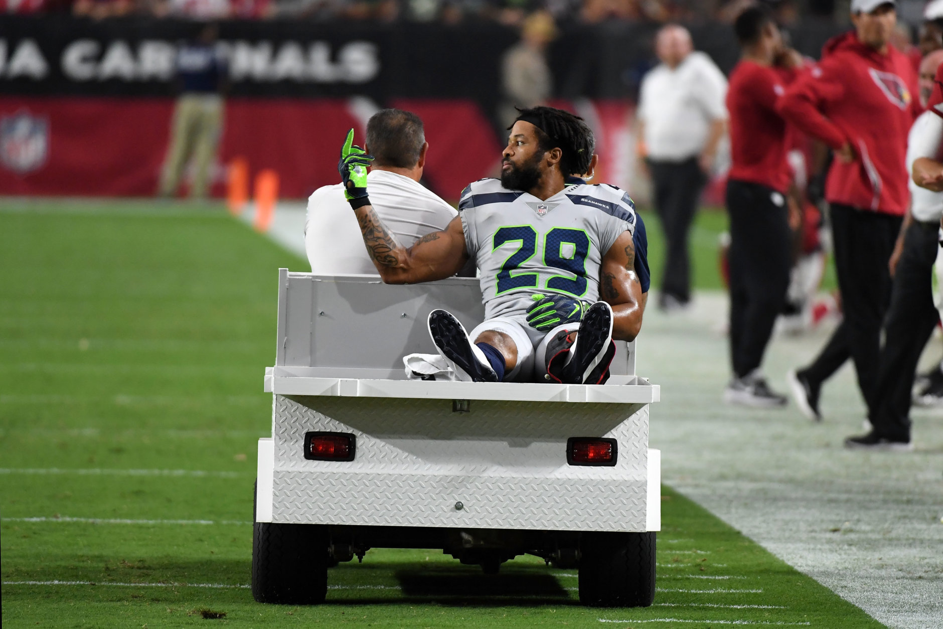 GLENDALE, AZ - SEPTEMBER 30:  Defensive back Earl Thomas #29 of the Seattle Seahawks gestures as he leaves the field on a cart after being injured during the fourth quarter against the Arizona Cardinals at State Farm Stadium on September 30, 2018 in Glendale, Arizona.  (Photo by Norm Hall/Getty Images)