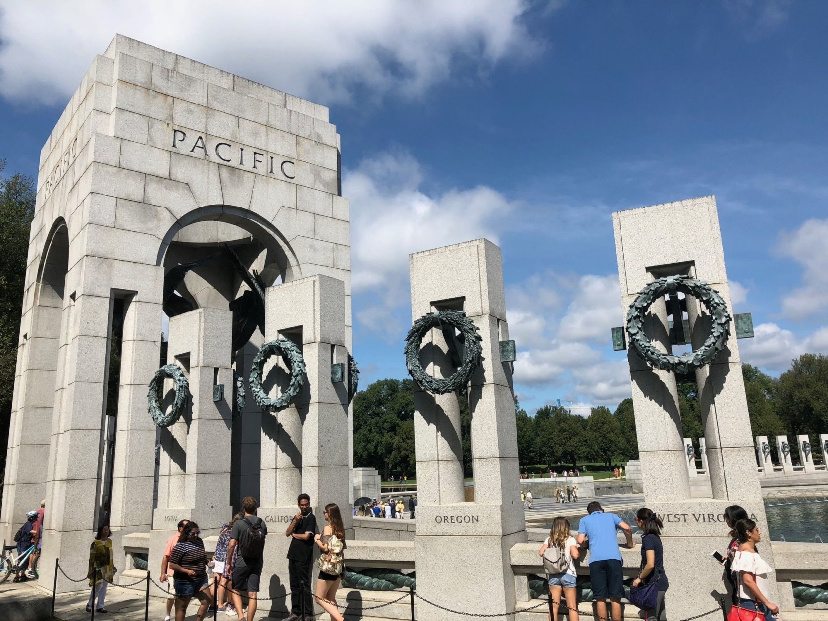The anniversary of the day Japan surrendered to the U.S., also known as V-J Day, is honored at the National World War II Memorial. (WTOP/Keara Dowd)
