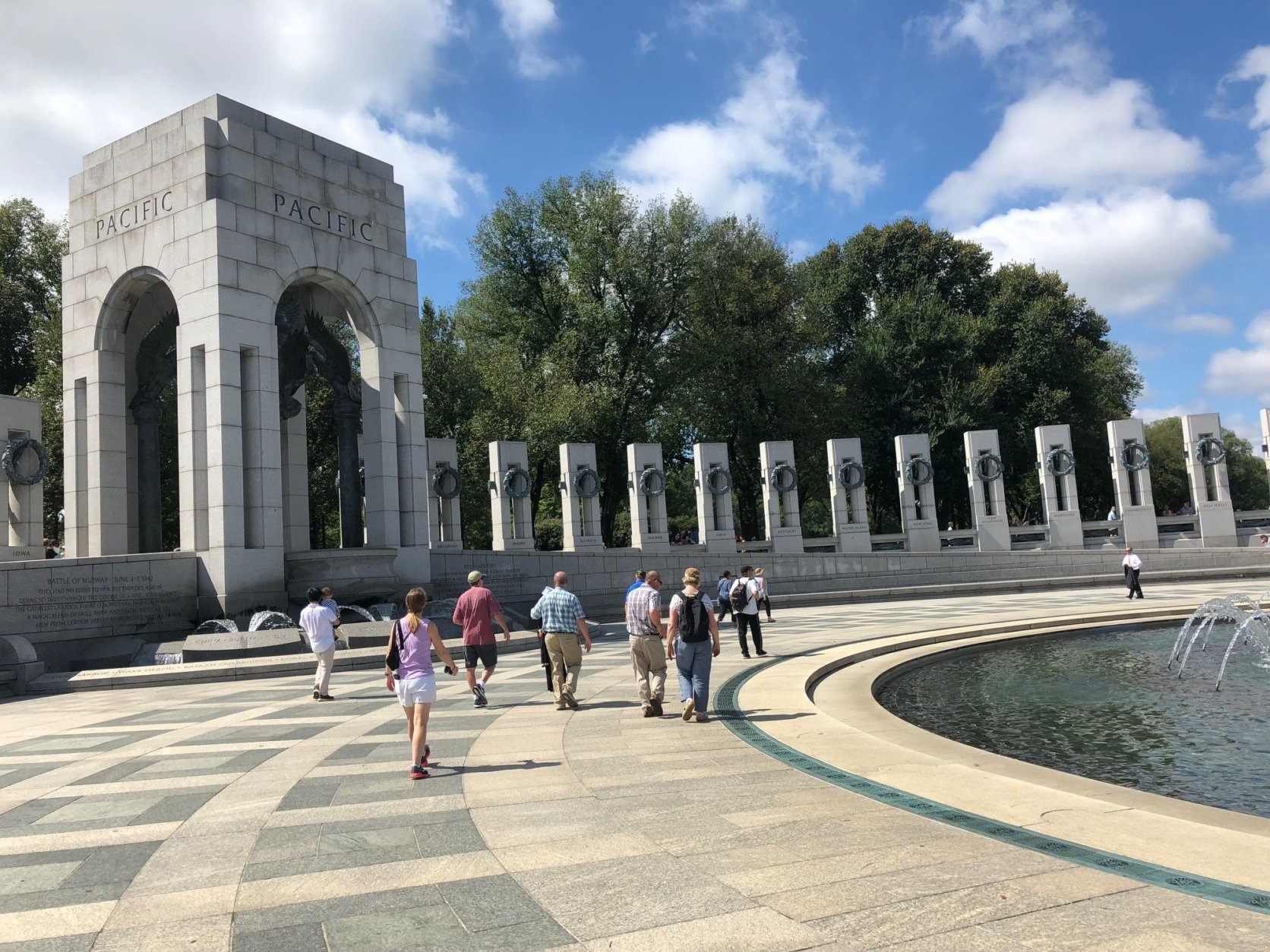 Visitors of the World War II memorial check out the Pacific side, on the anniversary of the day Japan surrendered to the U.S. (WTOP/Keara Dowd)