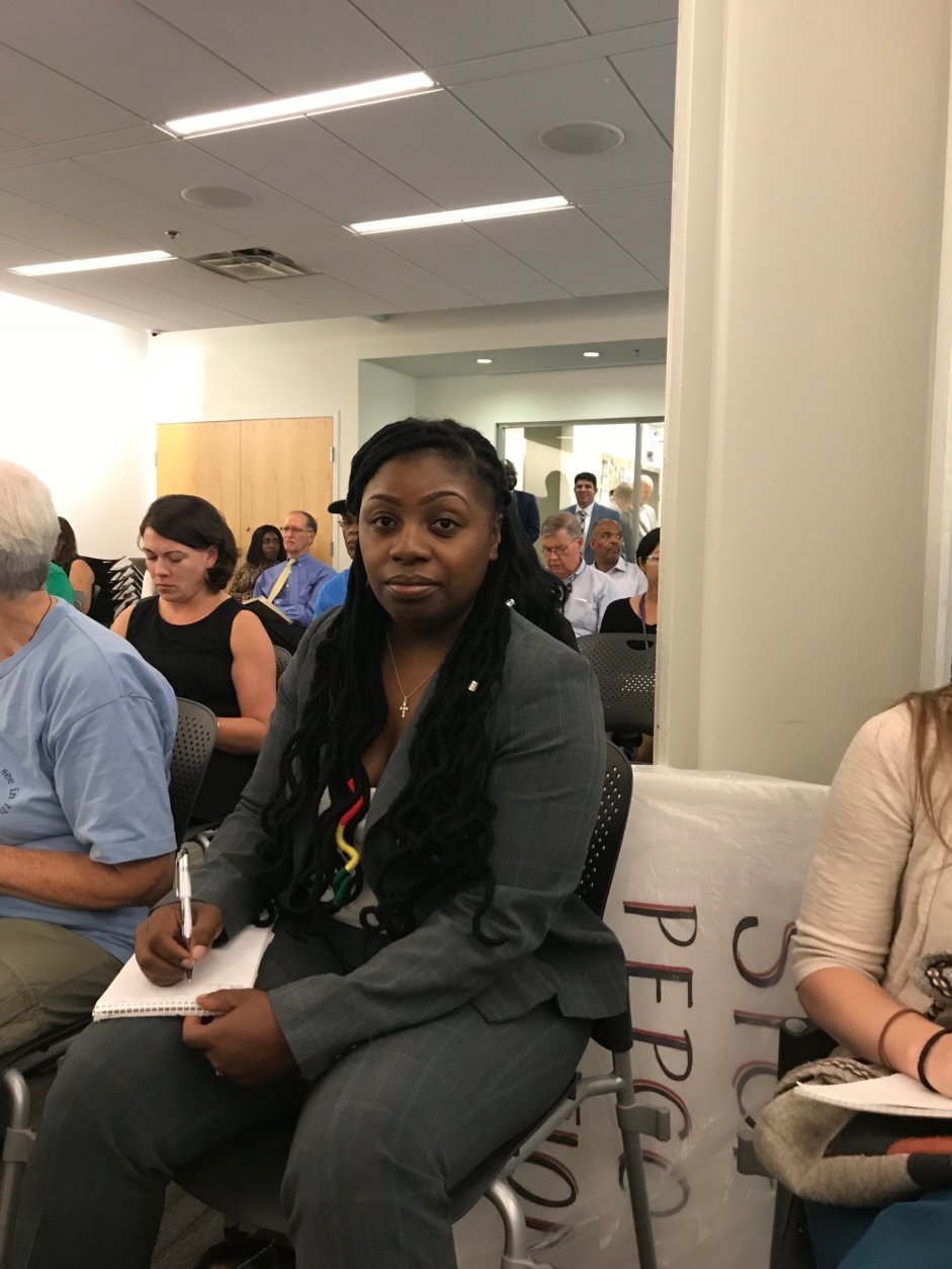 Tiffany Aziz, the mother of a third grader at Walker-Jones, shared concerns about Pepco's planned substation in Mt. Vernon. (WTOP/Dick Uliano)