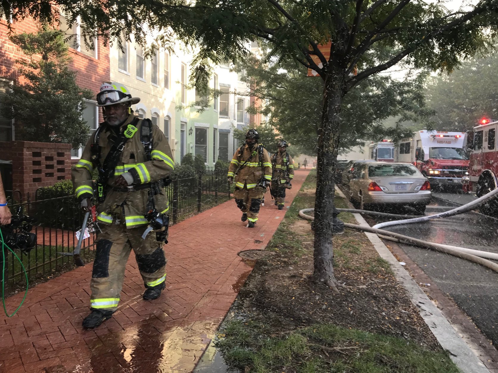 Firefighters work to put out the blaze at 900 5th St. SE in D.C. (WTOP/Dick Uliano)