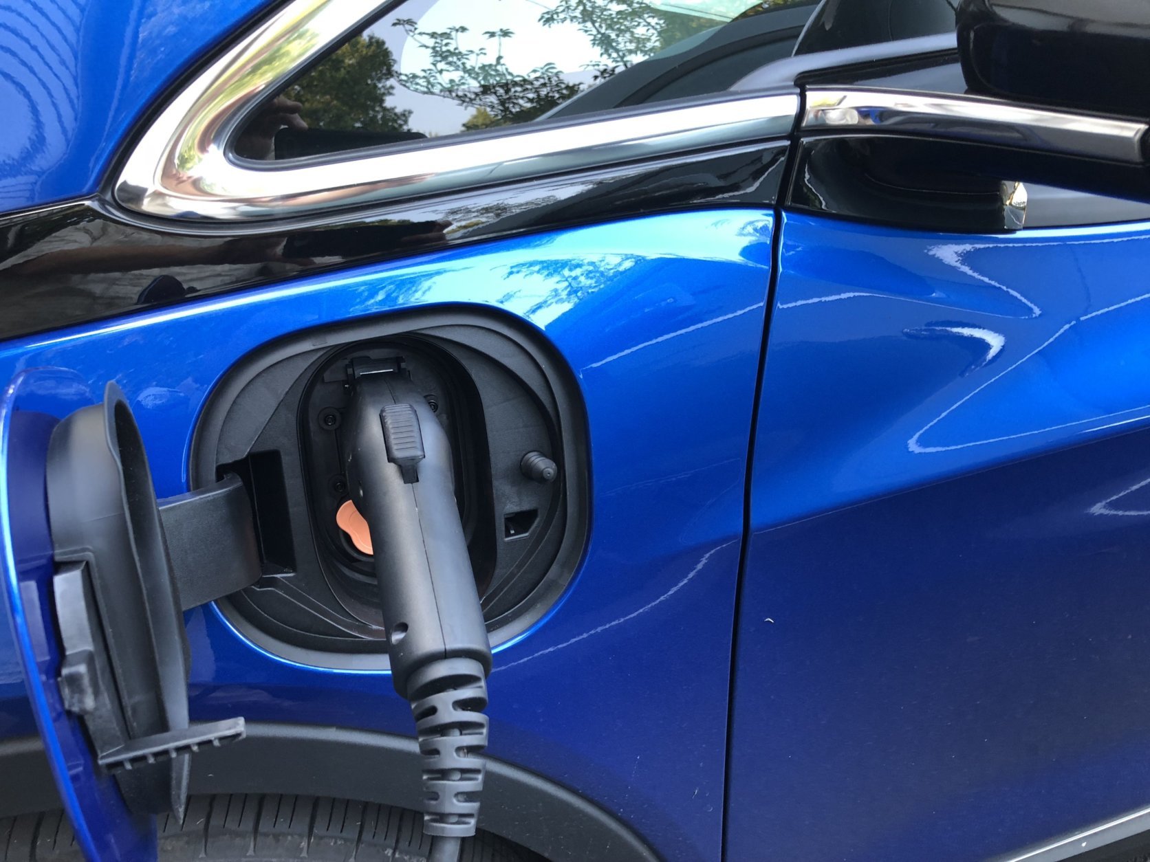Charging times with normal household power could take up to 20 hours so choosing the $750 DC fast- charging port allows you to use a fast-charging station giving you 90 miles range in just 30 minutes. (WTOP/Mike Parris)