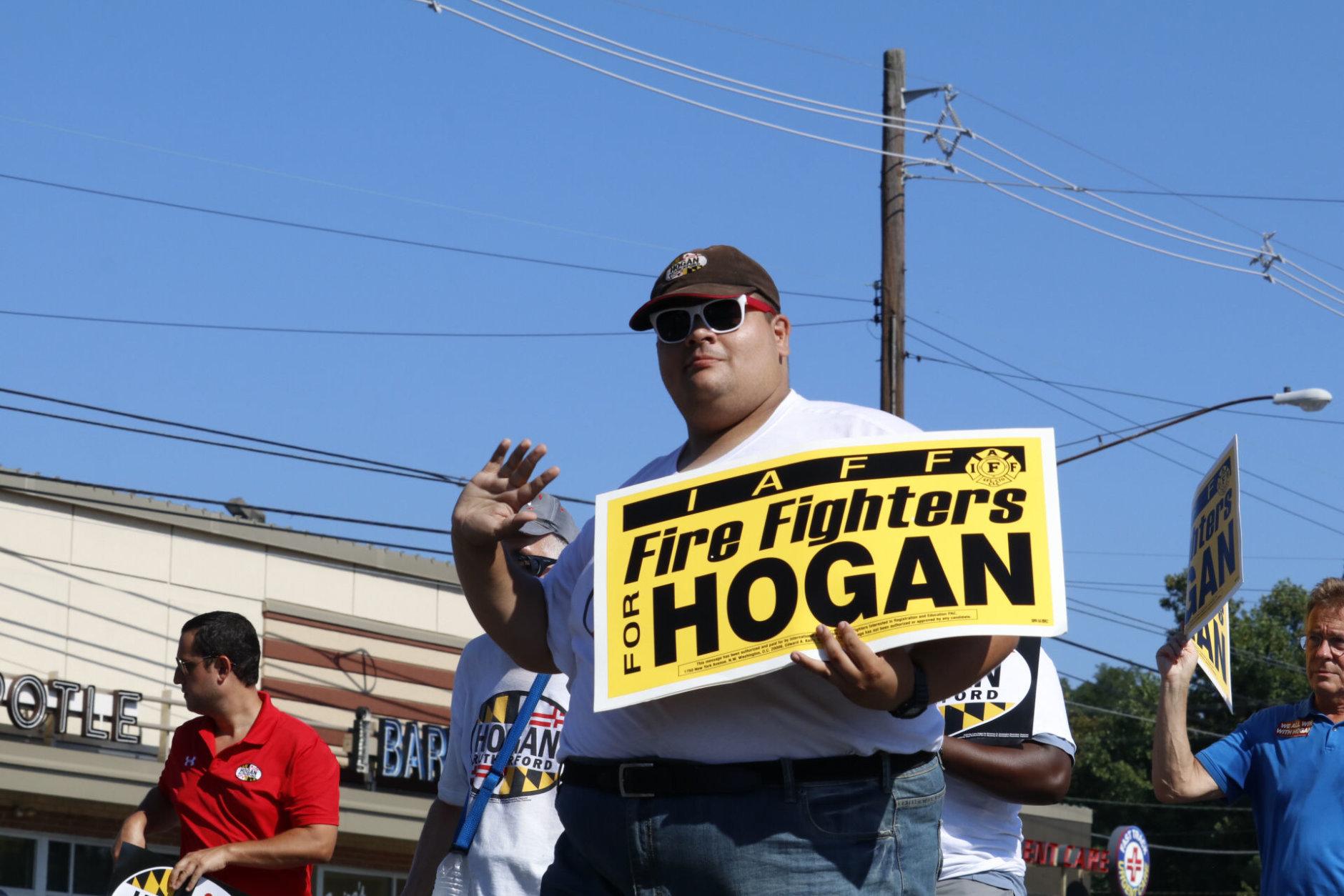 Hogan supporters showed up to support their candidate in the Kensington Labor Day parade. Hogan won the support of the IAFF : the Labor Union that represents firefighters. (WTOP/Kate Ryan)