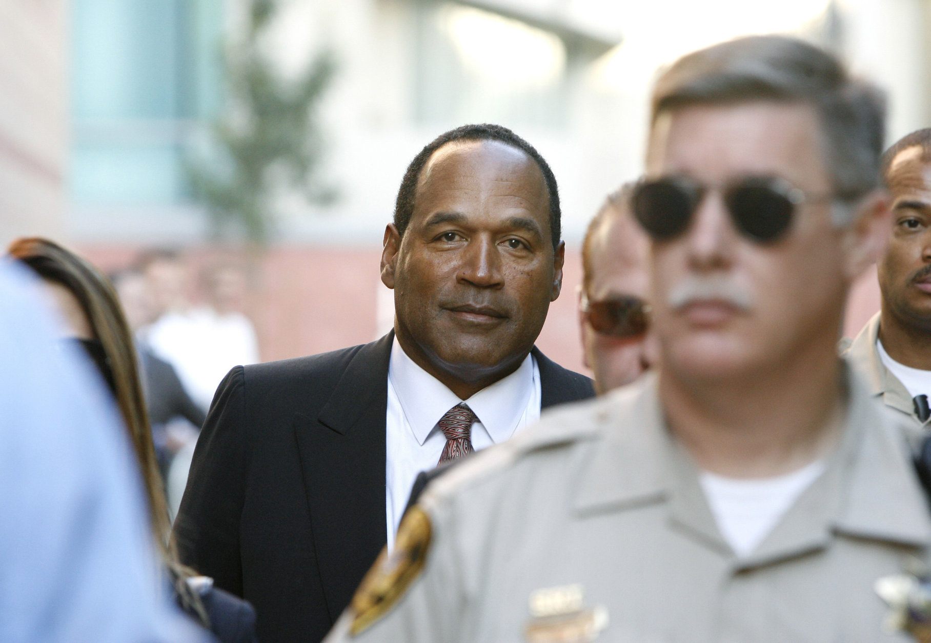 O.J. Simpson arrives at the Clark County Regional Justice Center on the second day of jury selection for his trial in Las Vegas, Tuesday, Sept. 9, 2008. Simpson faces 12 charges, including felony kidnapping, armed robbery and conspiracy. (AP Photo/Isaac Brekken)