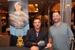 Medal of Honor recipient Leroy Petry poses with an admirer. (Courtesy Shmulik Almany/Congressional Medal of Honor Society)