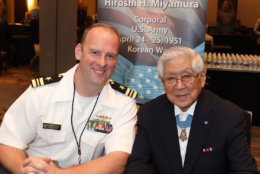 Medal of Honor recipient Hiroshi Miyamura poses with a Naval officer. (Courtesy Shmulik Almany/Congressional Medal of Honor Society)