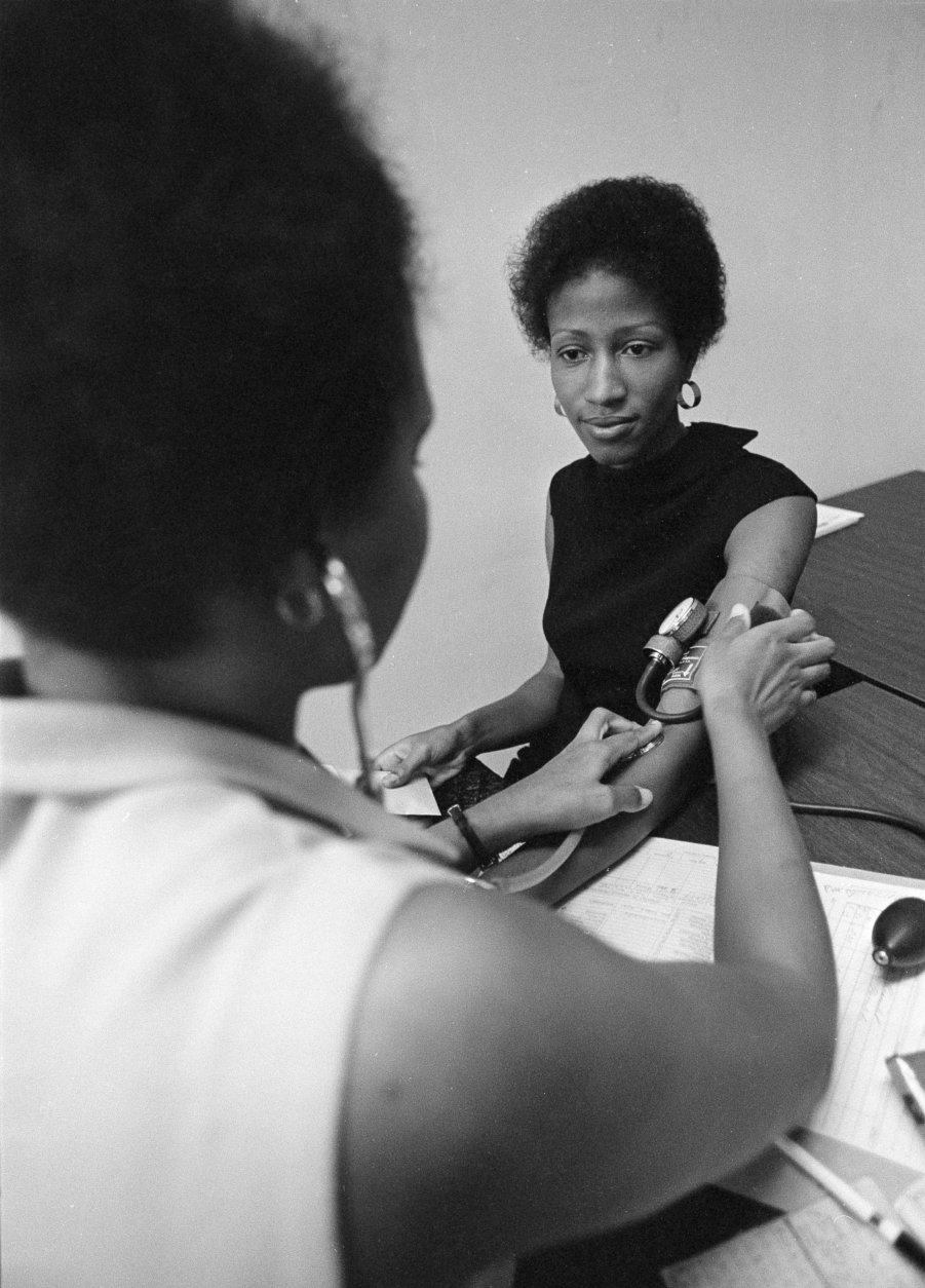 Mrs. Mary Bramlett gets her blood pressure checked at the Family Planning Clinic in New Orleans, La., May 25, 1971, before she is issued a 3-month supply of birth control pills. The center is only one of 170 in Louisiana that gives birth control information and aid to the public. (AP Photo)