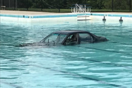A car plunges into a community pool in a Montgomery County community center on Saturday, Sept. 15, 2018. (Courtesy Montgomery County Fire and Rescue)