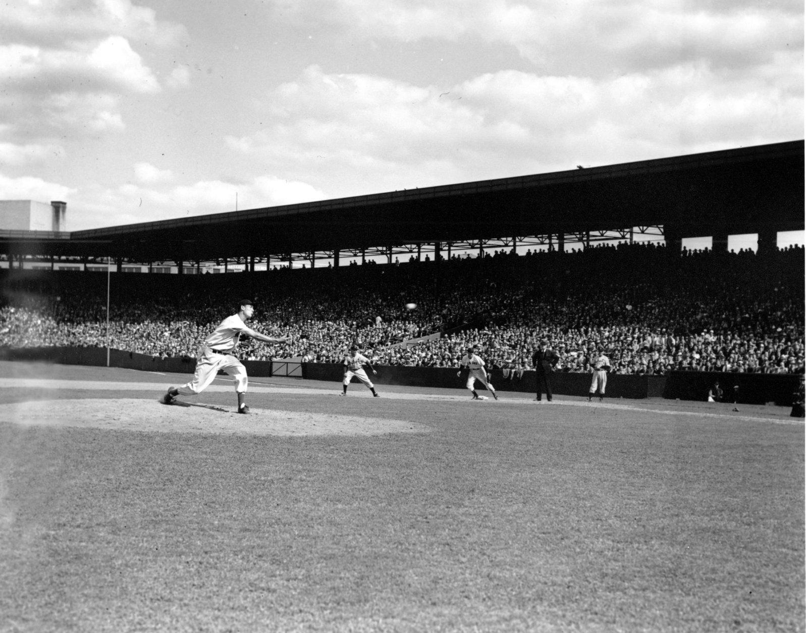 Boston Red Sox outfielder Ted Williams, nicknamed "The Kid," makes his major league pitching debut with the score 12-1 for the Detroit Tigers at Fenway Park in Boston, Ma. on Aug. 24, 1940.  (AP Photo)