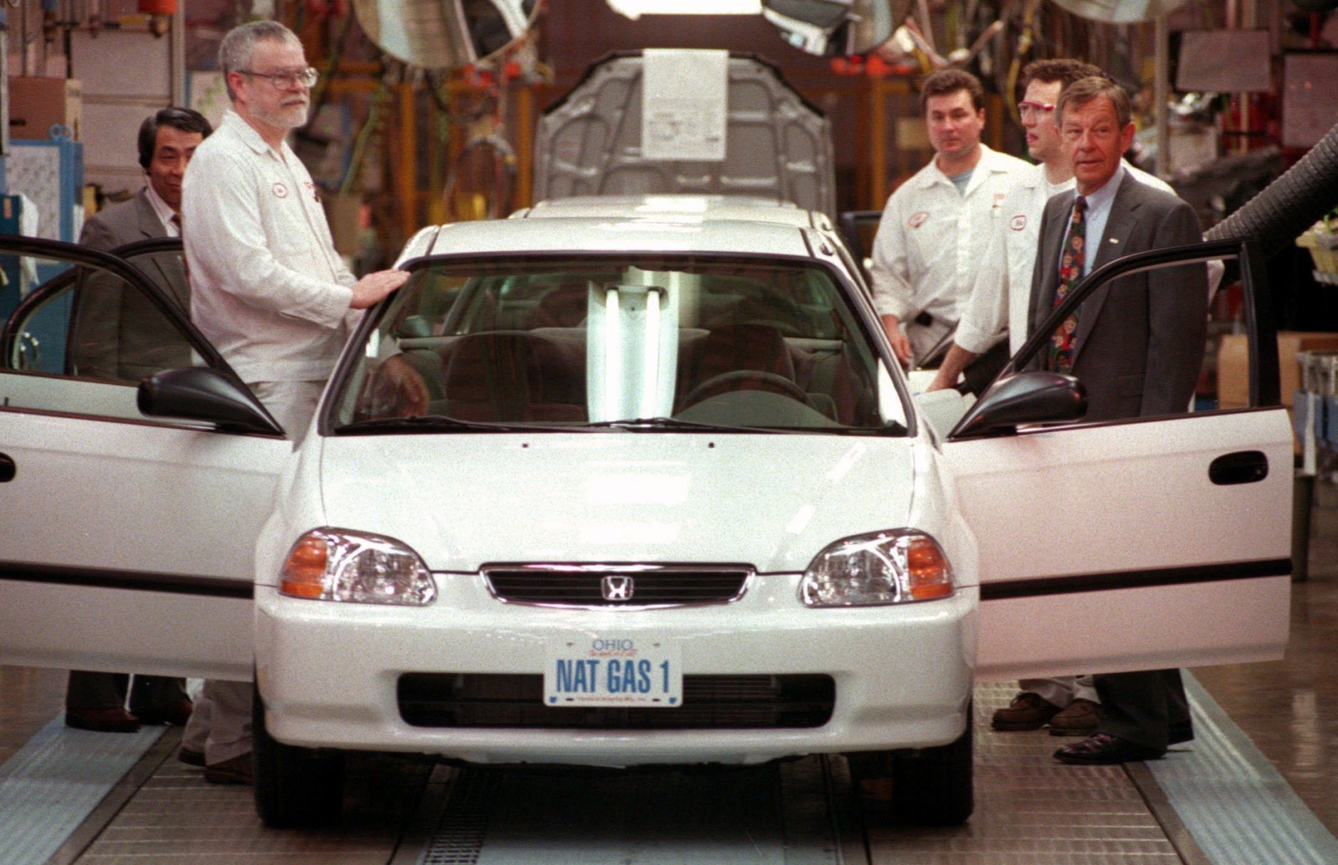 The 1998 Honda Civic is the most stolen car overall. Ohio Gov. George Voinovich, right, gets ready to step into a new natural-gas-powered Honda Civic GX in East Liberty, Ohio, Wednesday, April 8, 1998. Voinovich was invited to drive the first of the new cars off the line during a ceremony marking its entry into the North American market. The tailpipe carbon dioxide emissions of the Civic GX are 20 percent less than a gasoline-powered car, and other toxic emissions have been slashed to almost zero, the company said. (AP Photo/Chris Kasson)