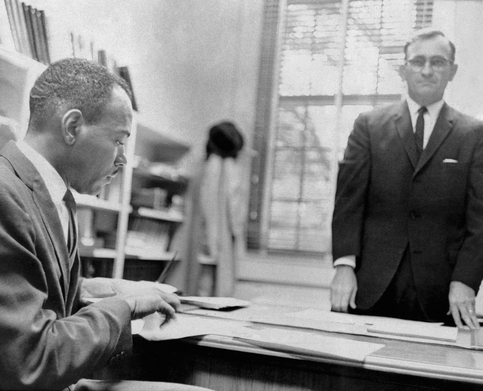 James Meredith is shown as he was registered as a student at the University of Mississippi by Register Robert Ellis in Oxford, Miss., on Oct. 1, 1962. (AP Photo)
