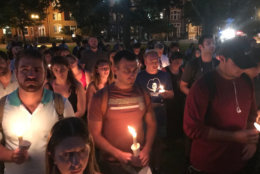 A crowd gathers in D.C.'s Logan Circle on Thursday, Sept. 20, 2018, during a vigil for Wendy Martinez, 35, who was stabbed to death while out for a run (WTOP/Michelle Basch)