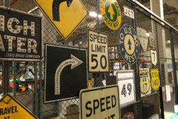 Signs are seen at the Maryland Highway Administration. (WTOP/Michelle Basch)
