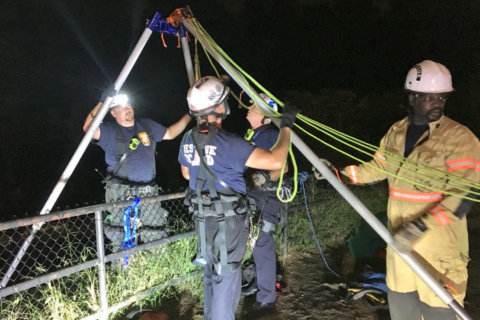 Injured woman rescued from steep slope in DC