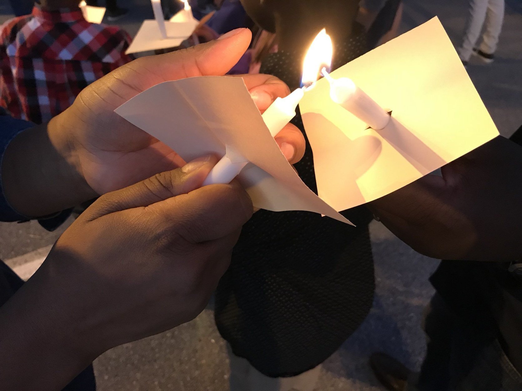 "Tonight was a night to remember, to honor, to celebrate two beautiful lives that were taken from us far too soon," Westover principal Audra Wilson said after the event, which drew dozens to the school's parking lot. (WTOP/Michelle Basch)