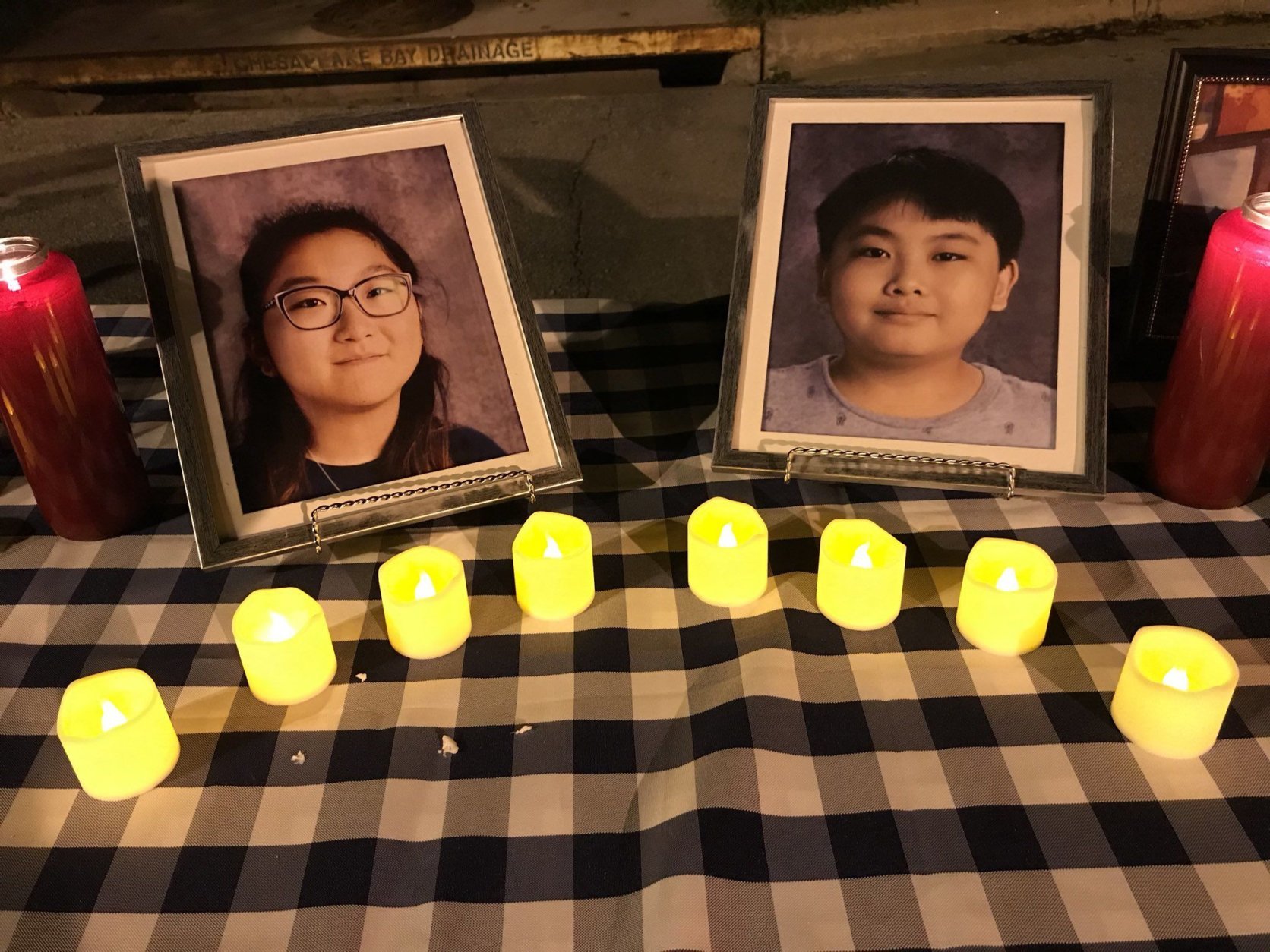 Ten-year-old Andy and 11-year-old Mina Kim are the youngest of four family members who died as a result of what police said was a murder-suicide at their home in the Colesville area. (WTOP/Michelle Basch)
