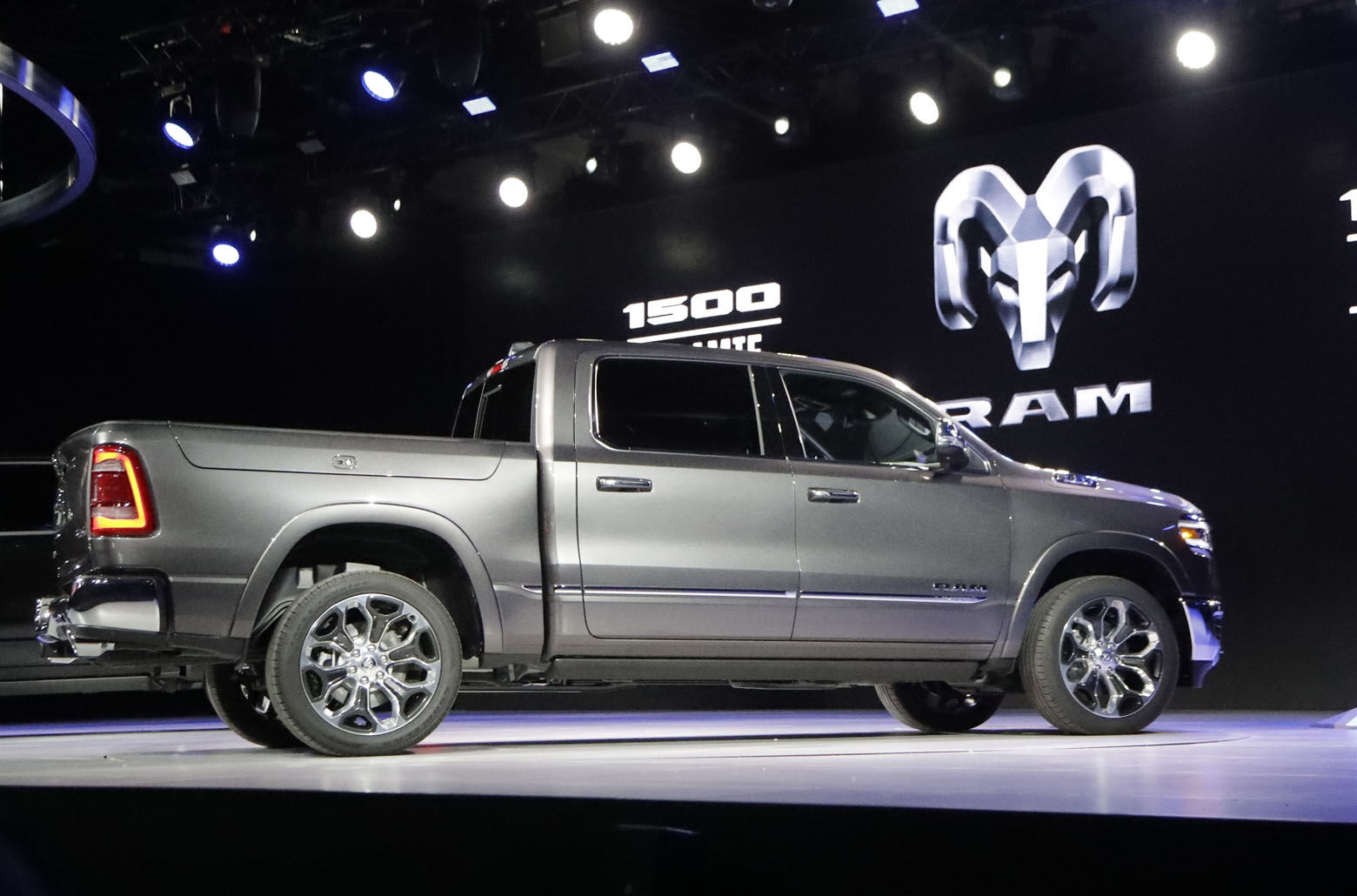 FILE- This Jan. 15, 2018, file photo shows the 2019 Ram 1500 at the North American International Auto Show in Detroit. Ram shook up the truck world a decade ago with a new rear suspension design that delivered sedan-like ride comfort without sacrificing capability. The rivals have since caught up, but the new Ram, thoroughly overhauled for 2019 and now on sale, continues to innovate. (AP Photo/Carlos Osorio, File)