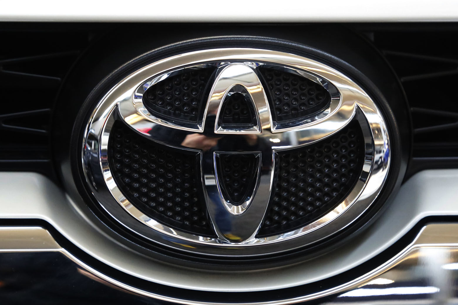 This is the Toyota logo on the grill of a 2018 Toyota 4Runner on display at the Pittsburgh Auto Show Thursday, Feb. 15, 2018. (AP Photo/Gene J. Puskar)