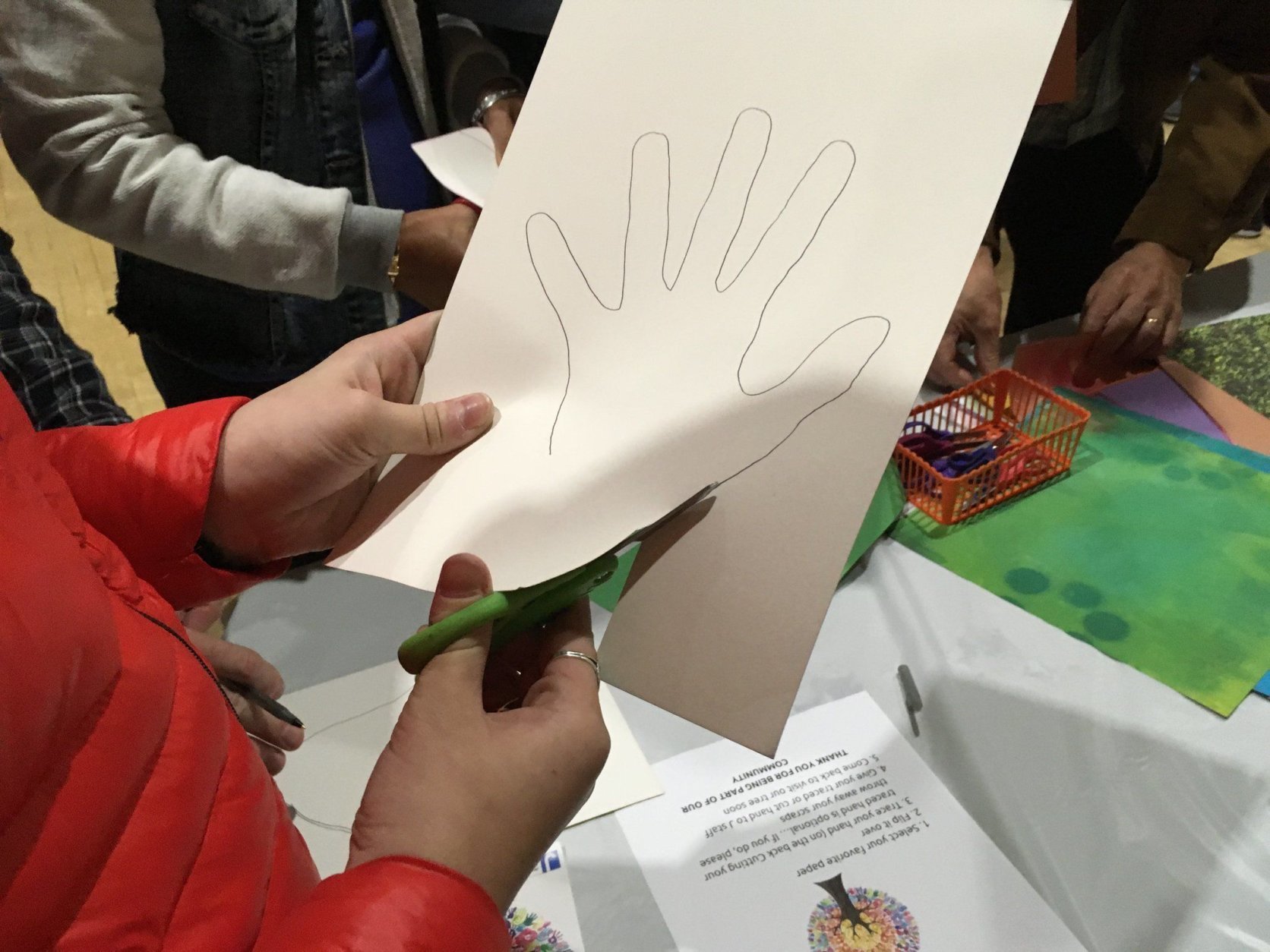 “We had the idea of having people trace their hand prints to both show that they were here in solidarity and to represent the community as a whole,” said Sarah Berry, Cultural Arts Director of the JCC. (WTOP/Liz Anderson)