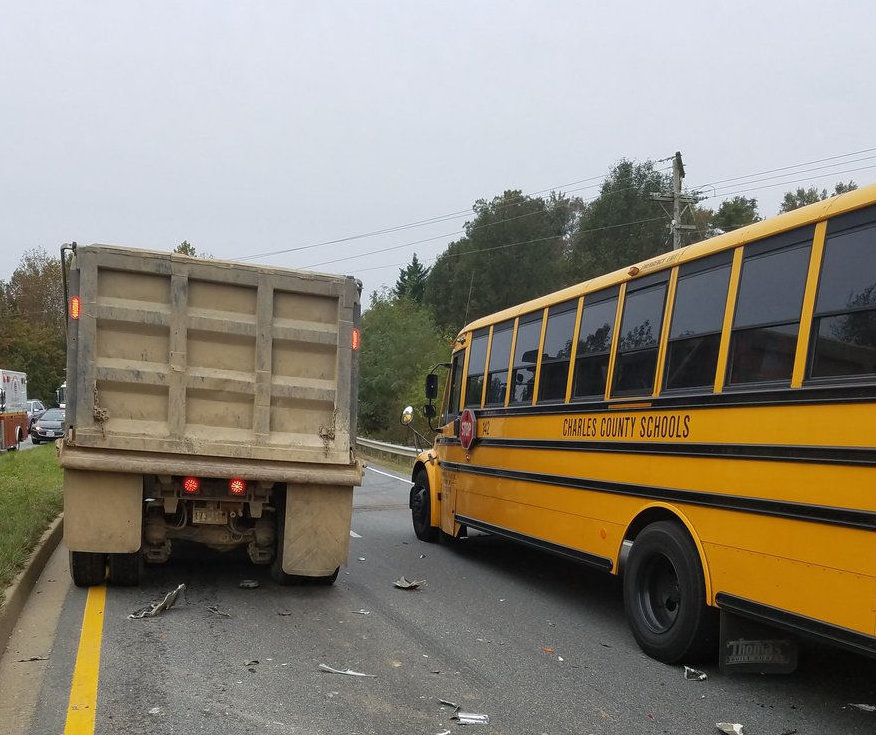 More than a dozen young students were sent to the hospital, three with minor injuries, Friday morning after a crash involving a Charles County, Maryland, school bus and a dump truck. (Courtesy Charles County Volunteer Fire and EMS)
