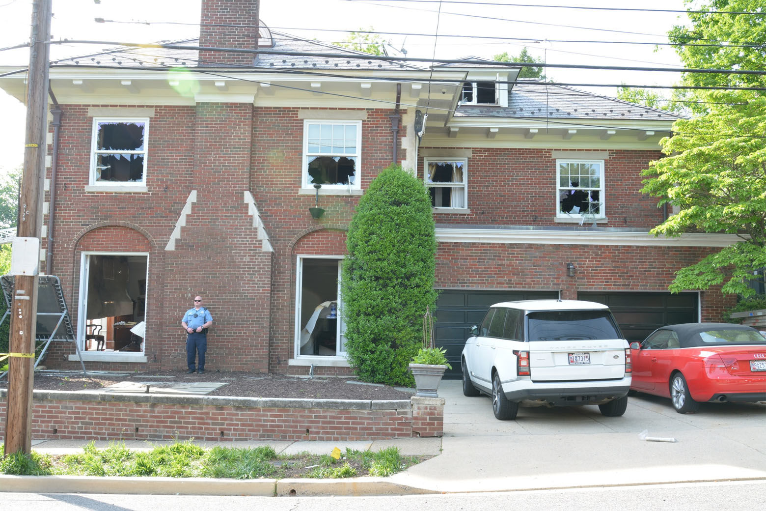 The Savopoulos house is seen in this crime scene photo from D.C. police. Fire officials testified they broke out many of the house's windows to ventilate the fire that raged on the home's second floor. (Courtesy U.S. Attorney's Office for D.C.)