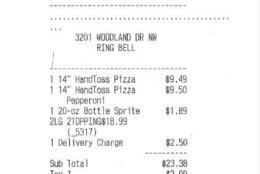 The receipt for the two pizzas that were delivered to the Savopoulos family's house while they were held captive.  (Courtesy U.S. Attorney's Office for D.C.)