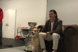 Caps players modeled with canine-friends for a Capitals Canine Calendar that will benefit Homeward Trails Animal Rescue. (WTOP/Liz Anderson)