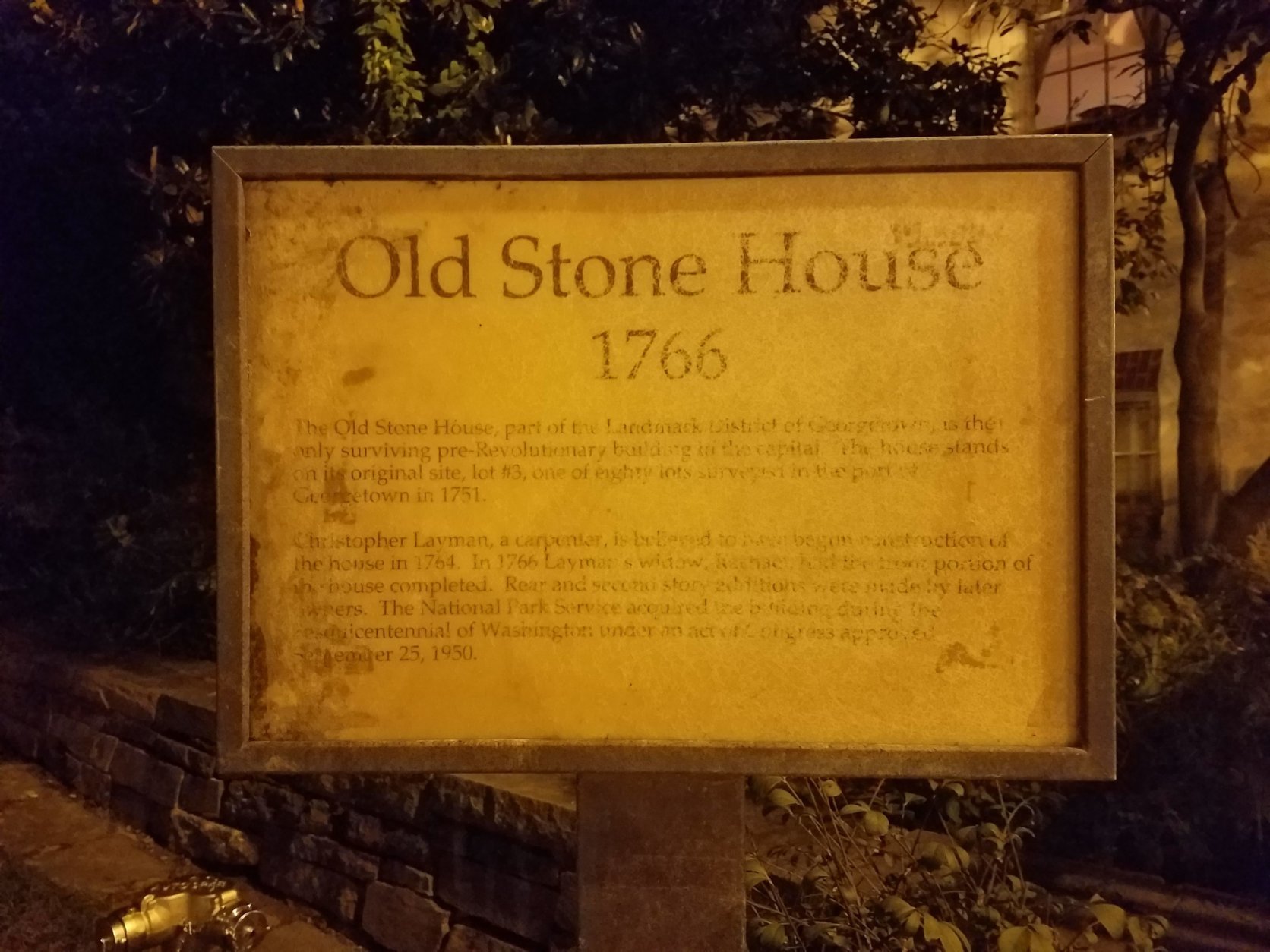 The sign outside the Old Stone House. (WTOP/Will Vitka)
