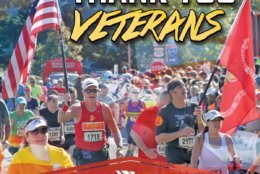 Steve Bozeman is pictured here holding the American flag while running the Marine Corps Marathon. (Courtesy Steve Bozeman)