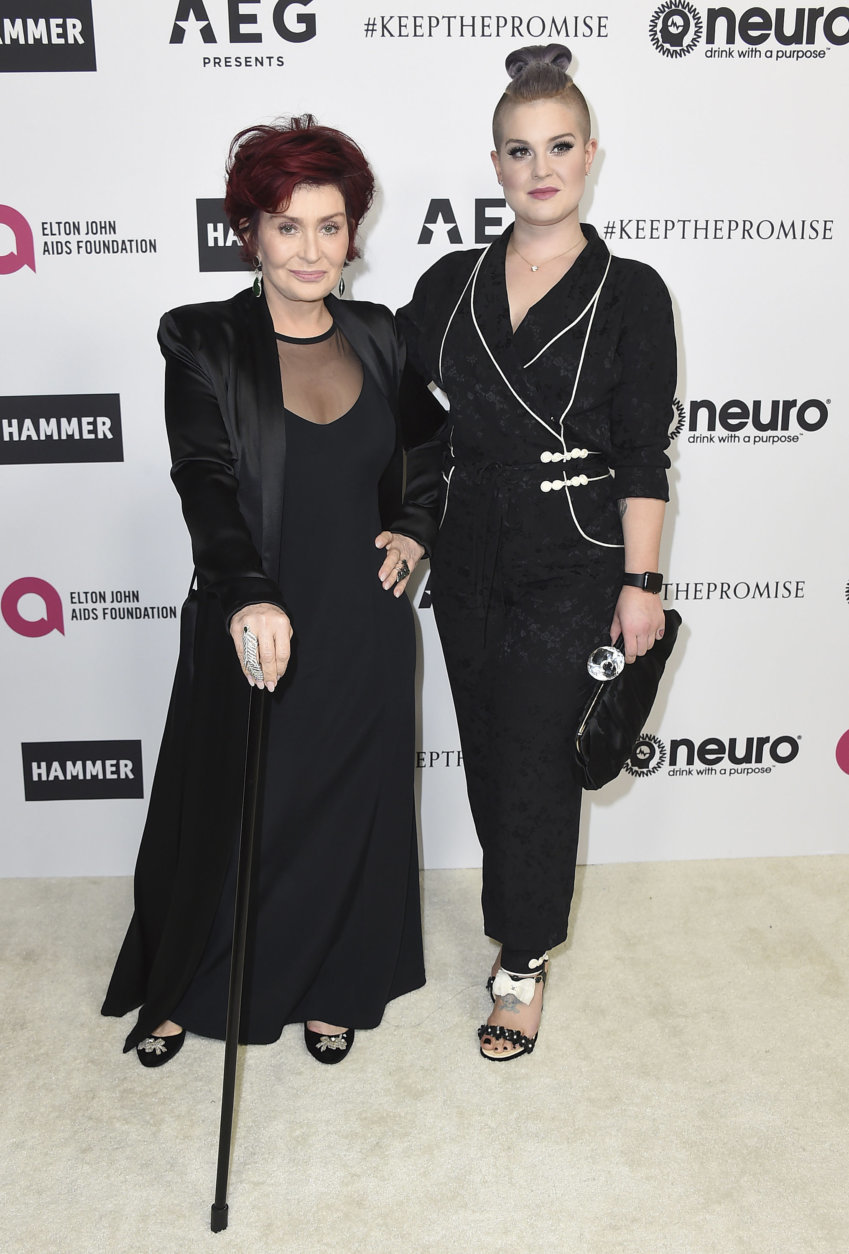 Sharon Osbourne, left, and Kelly Osbourne arrive at Elton John's 70th Birthday and 50-Year Songwriting Partnership with Bernie Taupin on Saturday, Mar. 25, 2017 in Los Angeles. (Photo by Jordan Strauss/Invision/AP)