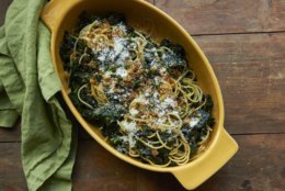 This January 2017 photo shows pasta with sauteed kale and toasted bread crumbs in New York. This dish is from a recipe by Katie Workman. (Mia via AP)