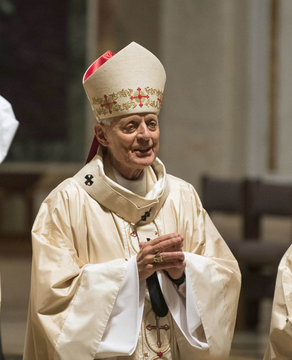 Cardinal Donald Wuerl, Archbishop of Washington, conducts Mass at St. Mathews Cathedral, Wednesday, August 15, 2018 in Washington. (AP Photo/Kevin Wolf)