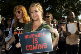 Actress and comedian Amy Schumer joins a march against Supreme Court nominee Brett Kavanaugh from the Supreme Court to the Hart Senate Office Building in Washington, Thursday, Oct. 4, 2018. (AP Photo/Manuel Balce Ceneta)