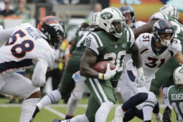 New York Jets' Isaiah Crowell (20) rushes past Denver Broncos' Von Miller (58) during the first half of an NFL football game Sunday, Oct. 7, 2018, in East Rutherford, N.J. (AP Photo/Seth Wenig)