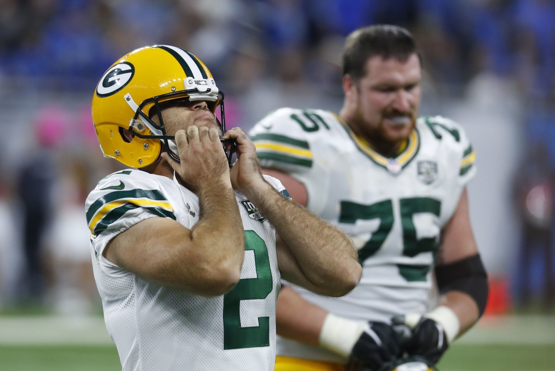 Green Bay Packers kicker Mason Crosby (2) walks off the field after missing his fourth field goal, during the second half of an NFL football game against the Detroit Lions, Sunday, Oct. 7, 2018, in Detroit. (AP Photo/Paul Sancya)