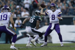 Minnesota Vikings' Kirk Cousins in action during the first half of an NFL football game against the Philadelphia Eagles, Sunday, Oct. 7, 2018, in Philadelphia. (AP Photo/Michael Perez)