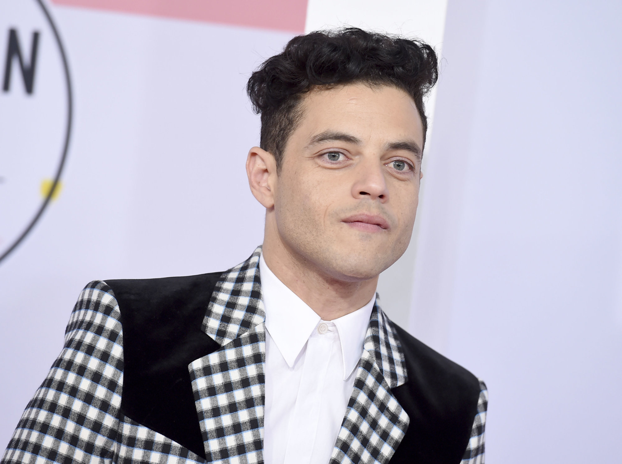 Rami Malek arrives at the American Music Awards on Tuesday, Oct. 9, 2018, at the Microsoft Theater in Los Angeles. (Photo by Jordan Strauss/Invision/AP)