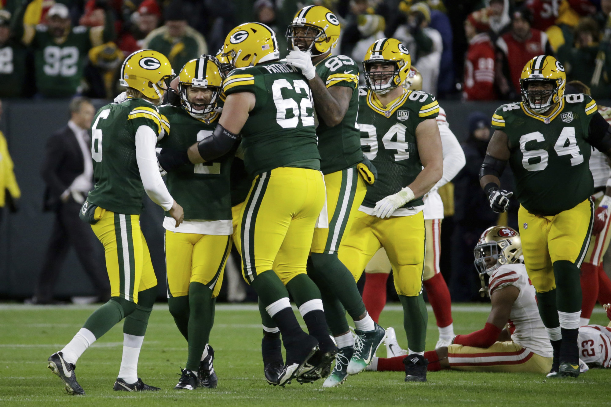 Green Bay Packers kicker Mason Crosby (2) celebrates with his teammates after kicking a game winning field goal during the second half of an NFL football game against the San Francisco 49ers Monday, Oct. 15, 2018, in Green Bay, Wis. The Packers won 33-30. (AP Photo/Mike Roemer)