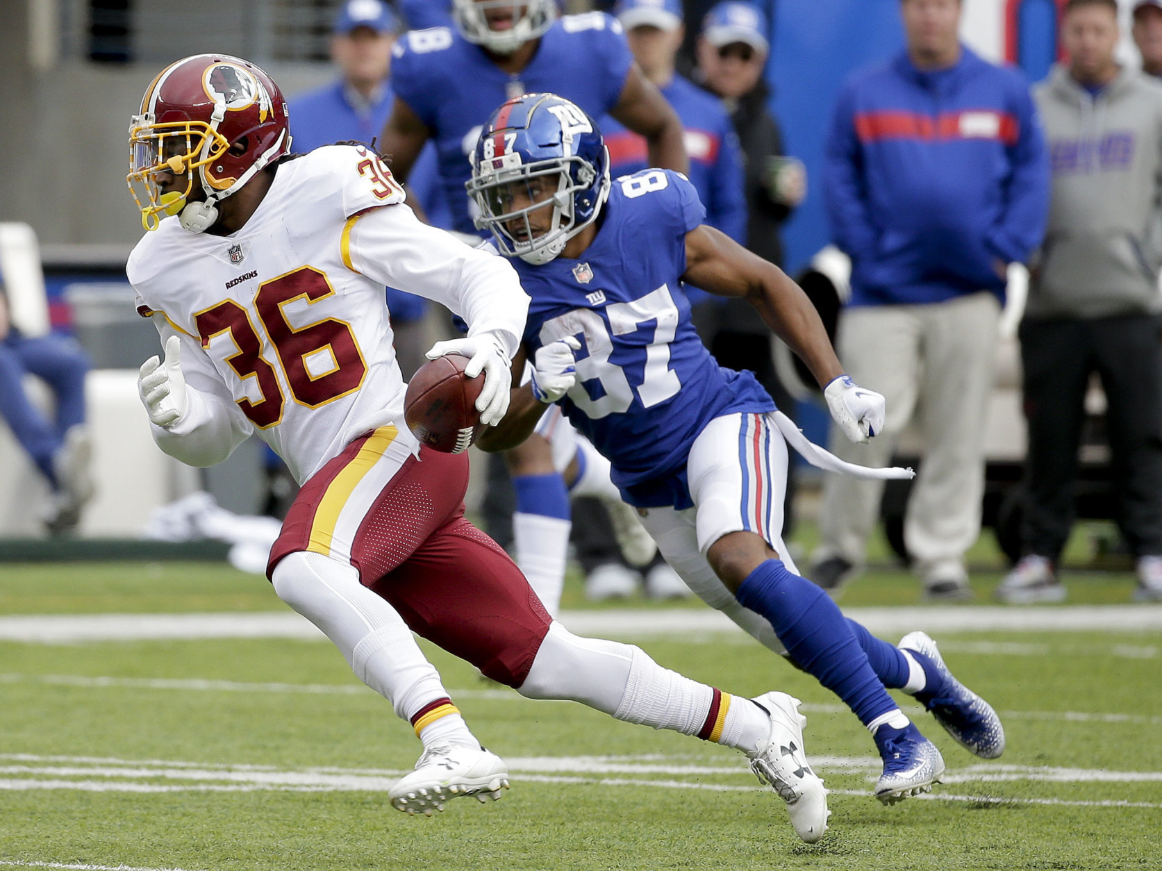 Washington Redskins free safety D.J. Swearinger (36) brings the ball back up the field after intercepting a pass by New York Giants quarterback Eli Manning during the third quarter of an NFL football game, Sunday, Oct. 28, 2018, in East Rutherford, N.J. (AP Photo/Seth Wenig)